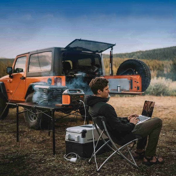Jackery Explorer 1000 Portable Power Station G1000A1000AH- showing person using product in outdoor adventure